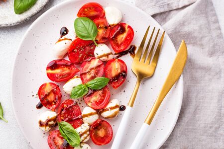 Caprese salad with tomatoes and mozzarellaの写真素材