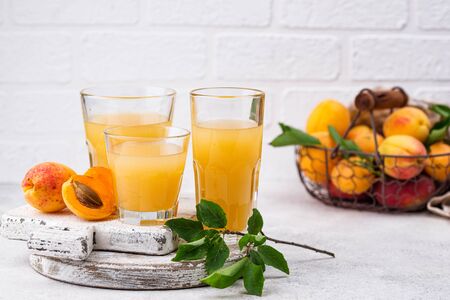 Apricot juice in glass. Healthy drinkの写真素材