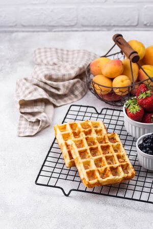 Waffles with berries and fruitの写真素材