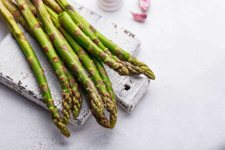 Fresh raw ripe green asparagusの写真素材