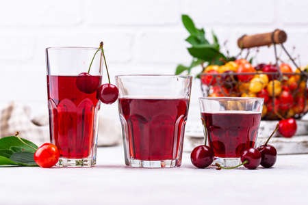 Fresh red cherry juice. Summer vitamin drinkの写真素材