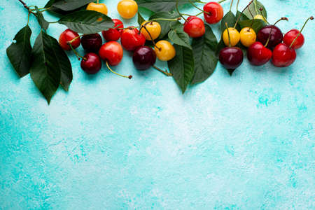 Fresh ripe red and yellow cherryの写真素材