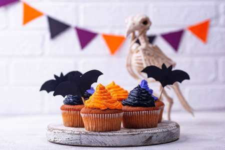 Halloween cupcakes with color creamの写真素材