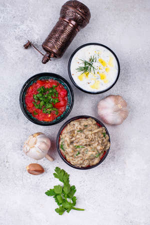 Baba ganoush, tzatziki and tomato ezmeの写真素材