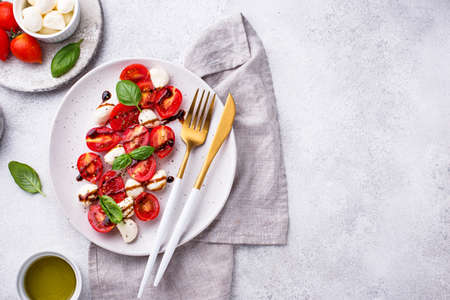 Caprese salad with tomatoes and mozzarellaの写真素材