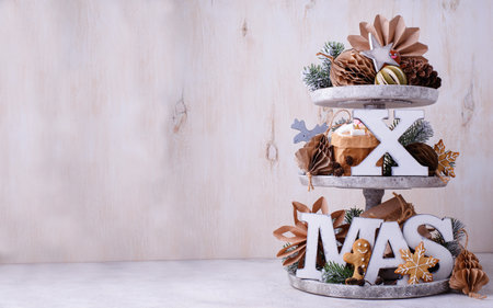 Christmas craft decoration on tiered trayの写真素材