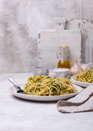 Spaghetti pasta with spinach and cheeseの写真素材