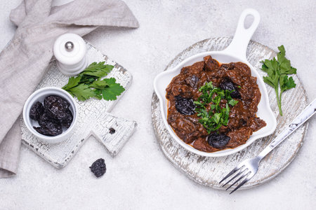 Hot stewed meat with prunesの写真素材