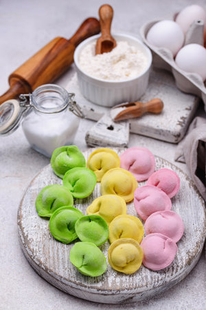 Multi colored dumplings stuffed with meatの写真素材