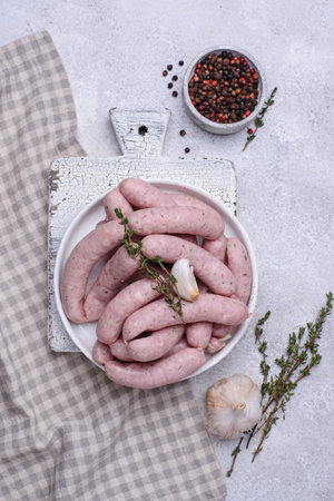 Raw uncooked sausages for grilledの写真素材