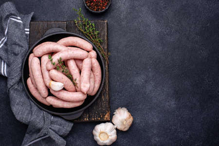Raw uncooked sausages for grilledの写真素材