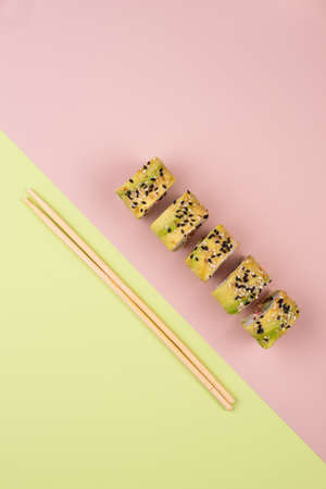 Sushi rolls on trendy color backgroundの写真素材