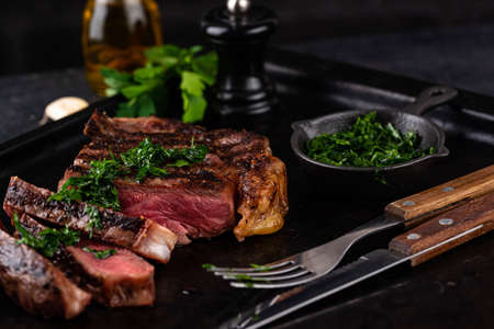 Grilled marbled rib eye steakの写真素材