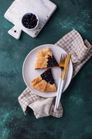 Sweet homemade galette pie with fruitsの写真素材