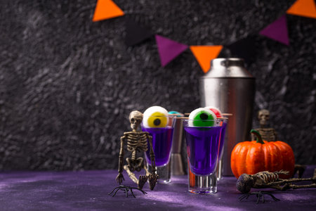 Halloween purple cocktail with eyes.の写真素材