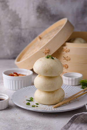 Chinese steamed buns baozi with steamerの写真素材