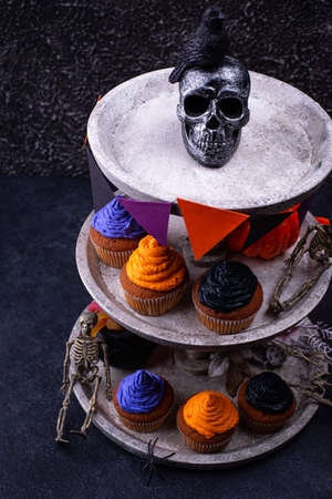 Halloween cupcakes with color creamの写真素材