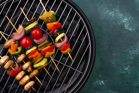 Grilled kebabs with meat, mushrooms and vegetables