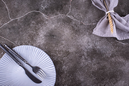 Table setting on grey concrete background