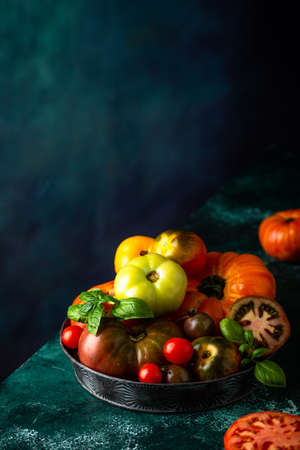 Assortment of different colorful tomatoesの写真素材