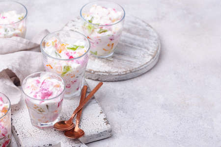 Multicolored dessert with fruit jellyの写真素材