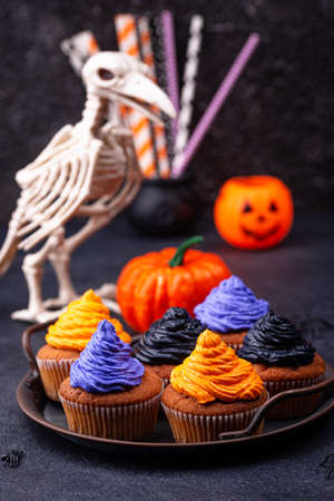 Halloween cupcakes with color creamの写真素材