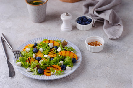 Salad with grilled peach, blueberry and fetaの写真素材