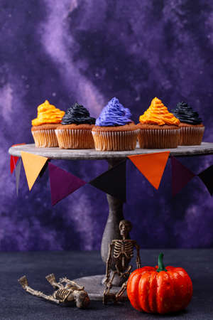 Halloween cupcakes with color creamの写真素材