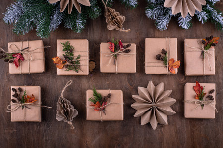 Christmas gift boxes in craft paper with eco friendly decoration