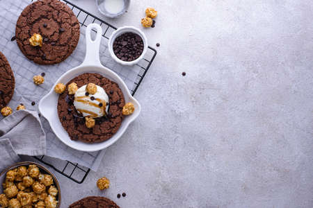 Giant chocolate skillet cookies with ice creamの写真素材