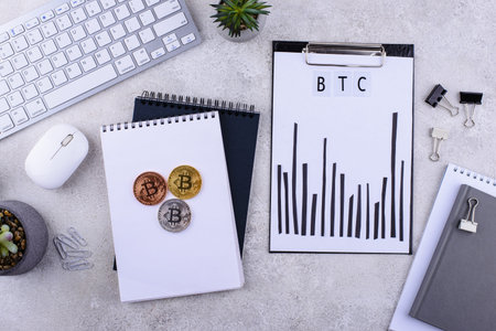 Bitcoin shedule on desk. Cryptocurrency concept