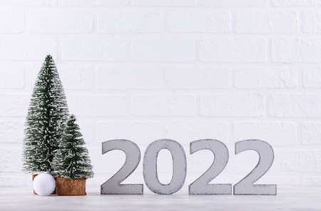 New Year composition with wooden numbers with date 2022の写真素材