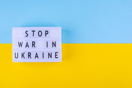 Stop war in Ukraine concept with flag colorsの写真素材