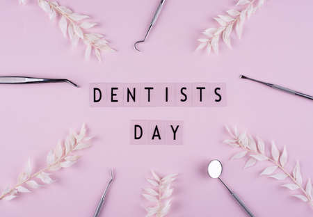 World dentists day concept with stomatology toolsの写真素材