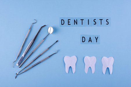 World dentists day concept with stomatology toolsの写真素材
