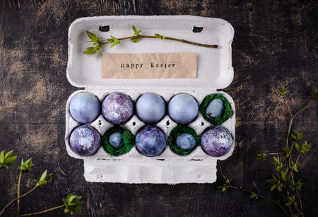 Festive Easter eggs in purple and blue colorの写真素材