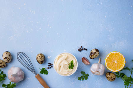 Homemade mayonnaise sauce with ingredientの写真素材