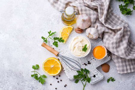 Homemade mayonnaise sauce with ingredientの写真素材