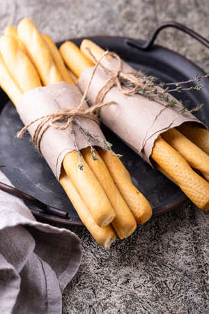Italian grissini, traditional appetizer breadstickの写真素材