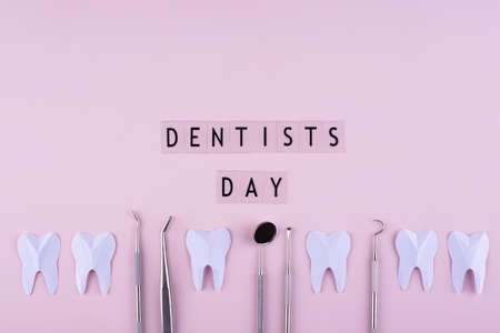 World dentists day concept with stomatology toolsの写真素材