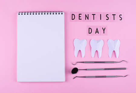 World dentists day concept with stomatology toolsの写真素材