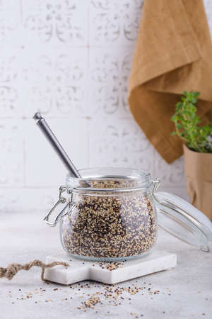 Red, white and brown quinoa.の写真素材