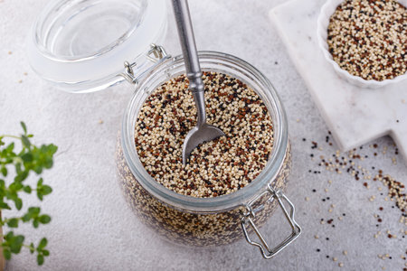 Red, white and brown quinoa.の写真素材