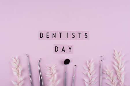 World dentists day concept with stomatology toolsの写真素材