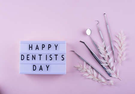 World dentists day concept with stomatology toolsの写真素材