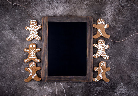Scary Halloween cookies in shape of mummyの写真素材