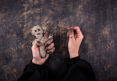 Voodoo doll. Black magic esoteric ritual. Halloween concept.の写真素材