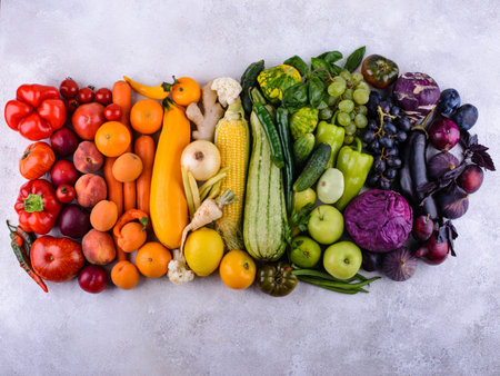 Assortment of rainbow color vegetables and fruitsの写真素材
