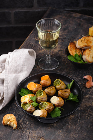 Baked snails Escargot with breadの写真素材