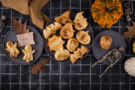 Halloween muffins in shape of bat and ghostの写真素材
